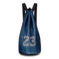 Carrying Large Basketball Training Net Bag At Gym